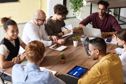 A team working together around a table