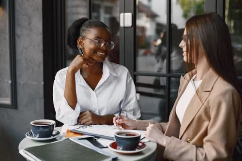 Two professionals in conversation